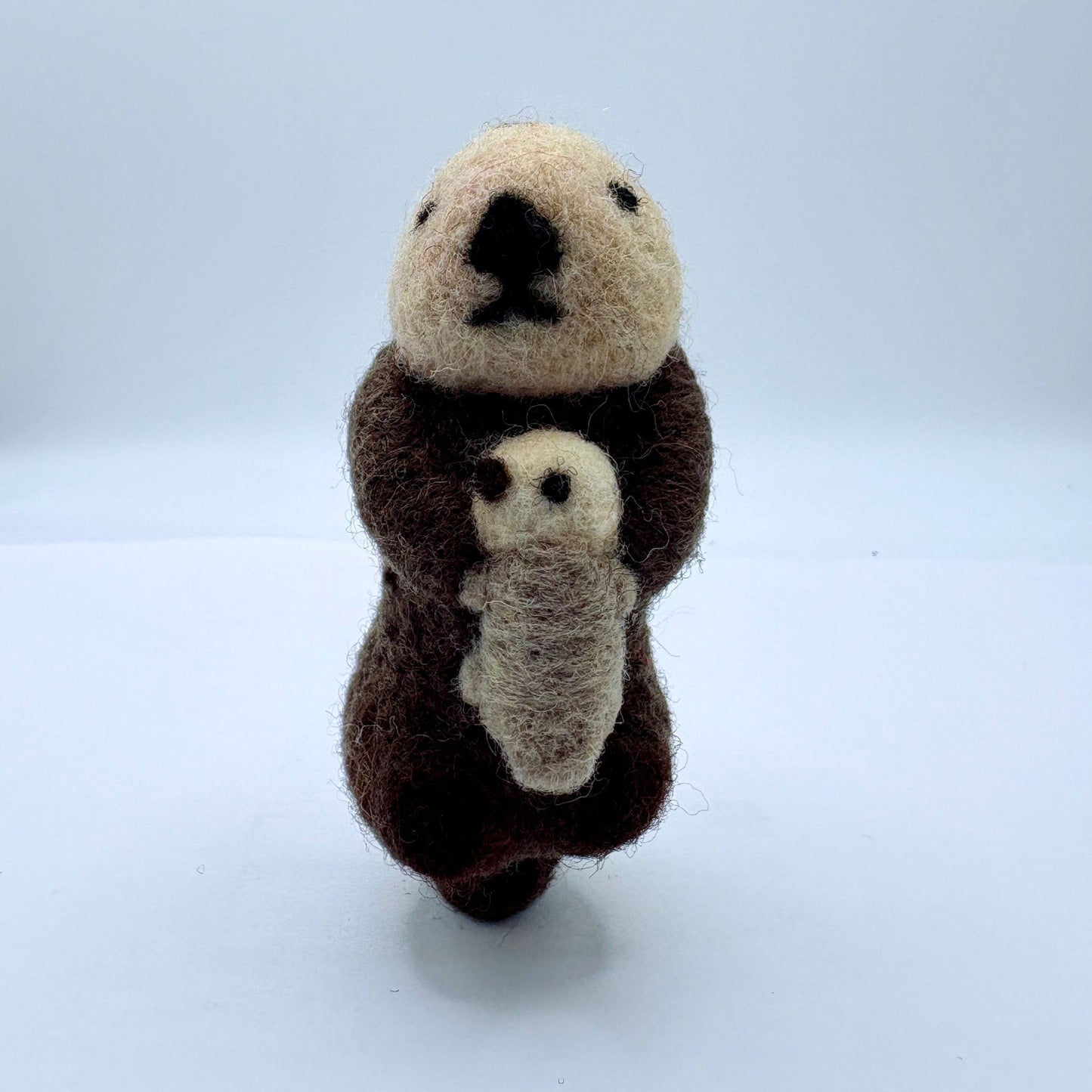 Otter with pup