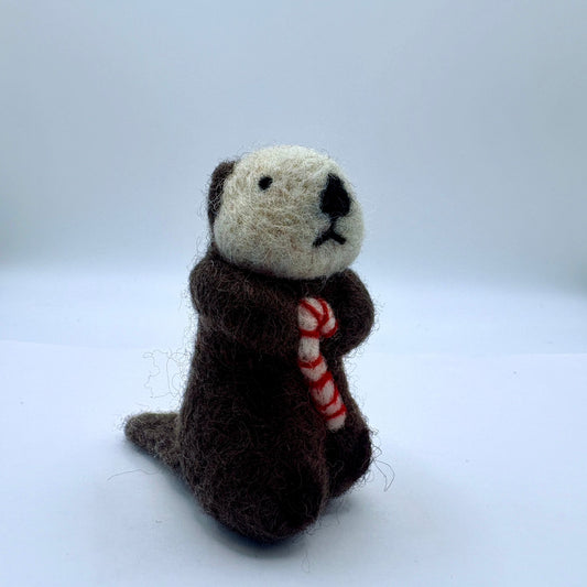 Otter with candy cane