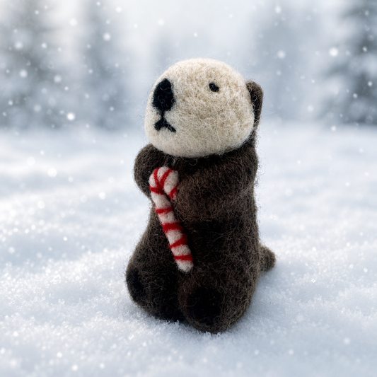 Otter with candy cane
