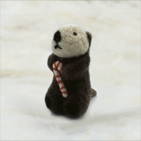 Otter with candy cane