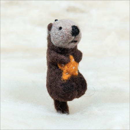 Otter with orange sea star