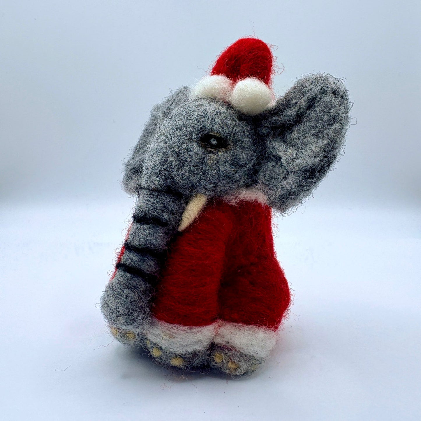 Elephant in Santa suit